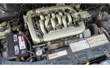 Ford-Taurus-1995-Emerald-Green-Tan-12