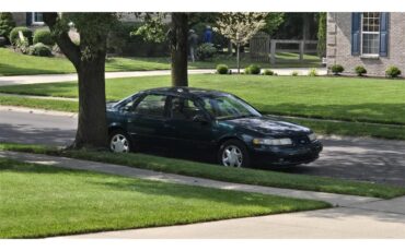 Ford-Taurus-1995-Emerald-Green-Tan-14