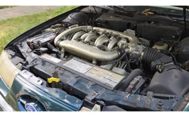 Ford-Taurus-1995-Emerald-Green-Tan-8