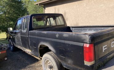 Ford-f-150-super-cab-1987-black-1