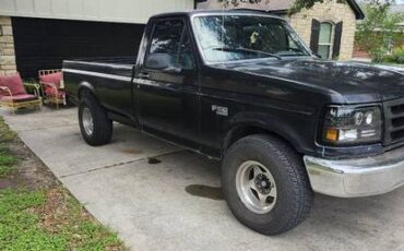 Ford-f150-regular-cab-xl-pickup-1994-black-1