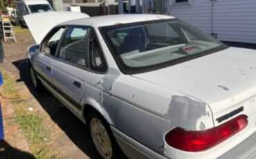 Ford-taurus-1992-white-1