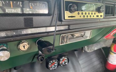 International-1210-camper-special-1973-green-17