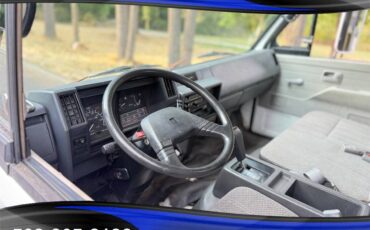 Isuzu-npr-4bd2t-turbo-diesel-lift-gate-flat-bed-1993-white-15