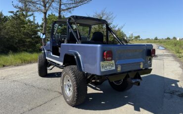 Jeep-Cj8-scrambler-1985-Blue-Black-32