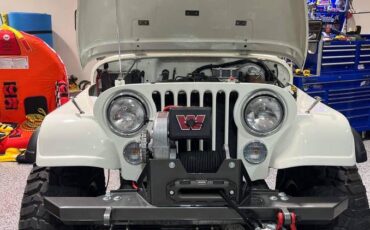 Jeep-cj-8-scrambler-open-body-with-extra-duty-susp-1982-white-10