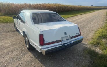 Lincoln-mark-viii-1984-white-1