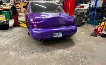 Lincoln-mark-viii-1995-purple-1