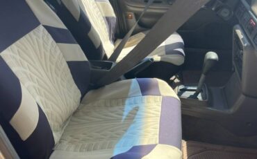 Mazda-protege-1994-brown-1