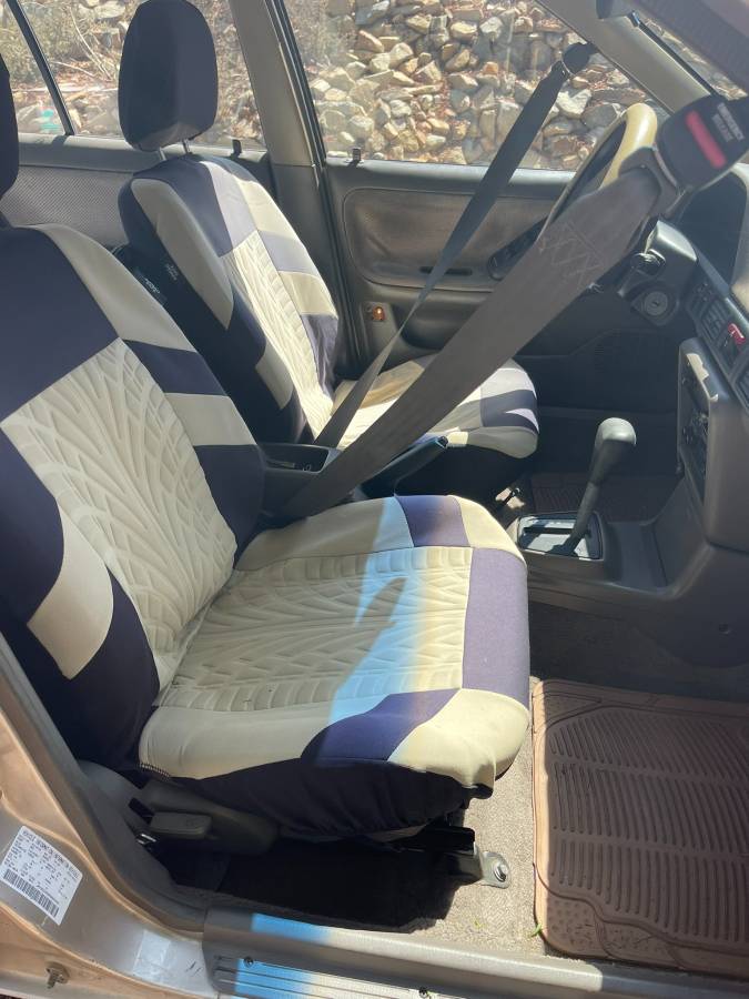 Mazda-protege-1994-brown-1