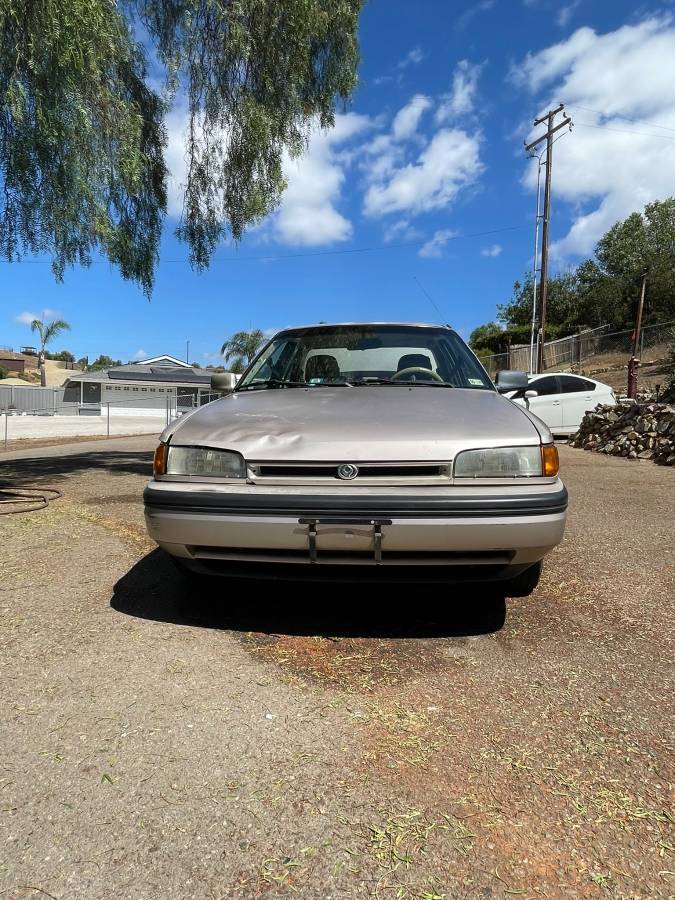 Mazda-protege-1994-brown-15