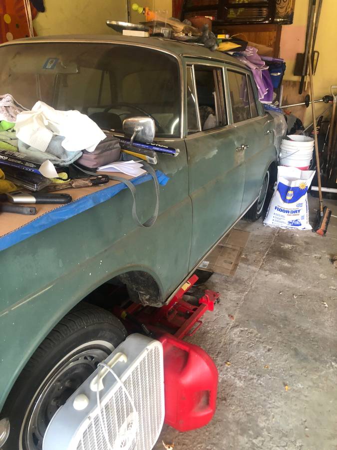 Mercedes-220-s-automatic-1963-green-10