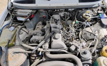 Mercedes-300-td-diesel-1985-white-12