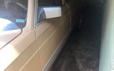 Mercedes-benz-420e-1987-brown
