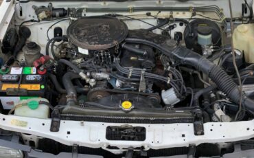 Nissan-d21-hardbody-xe-king-cab-1987-white-15