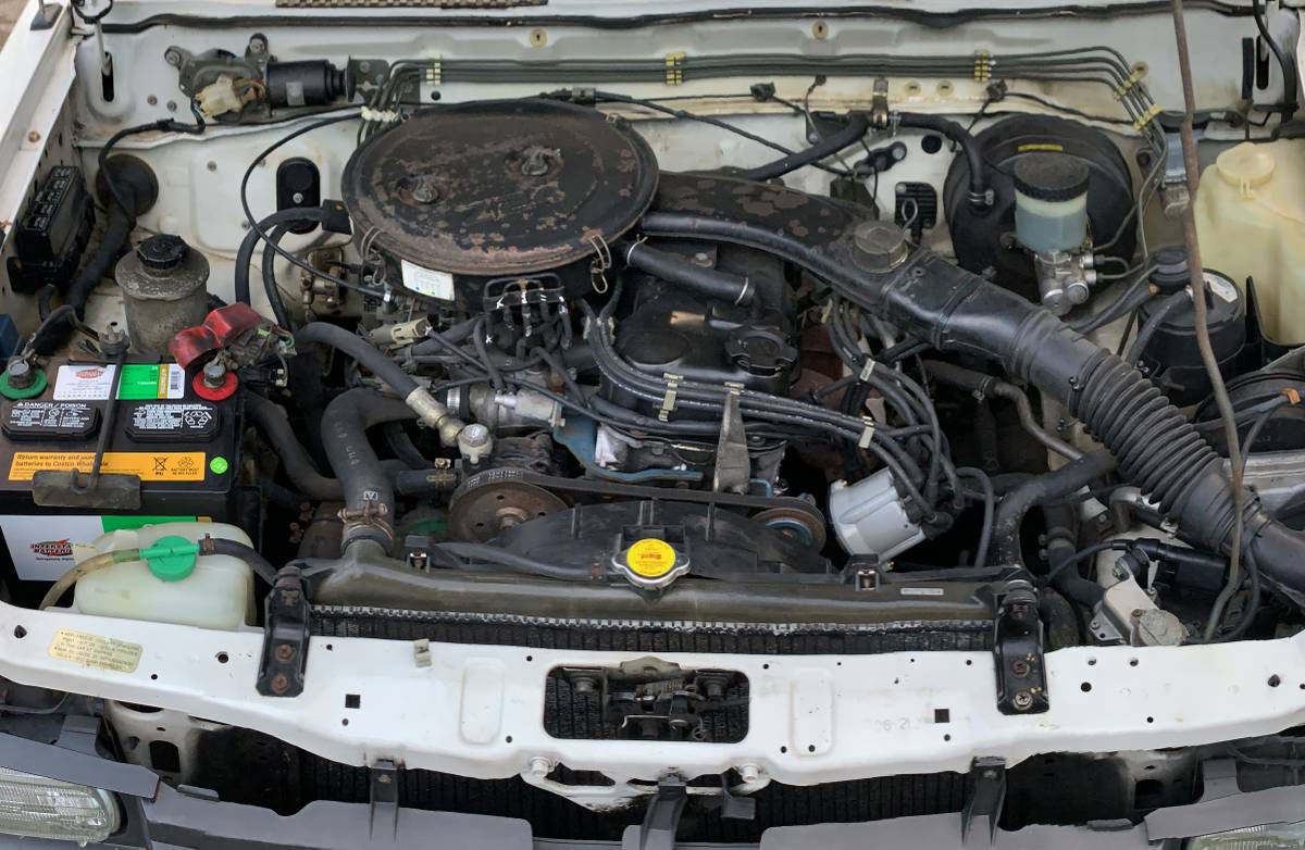 Nissan-d21-hardbody-xe-king-cab-1987-white-15