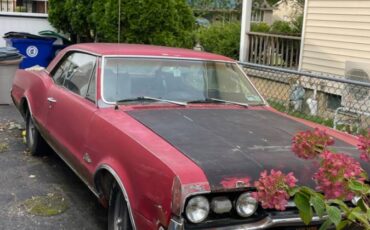 Oldmobile-cutlass-supreme-1967-red-1