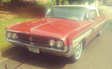 Olds-starfire-convertible-1964