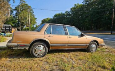 Oldsmobile-88-brougham-1990-brown-1