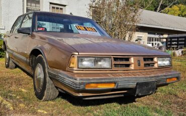 Oldsmobile-88-brougham-1990-brown