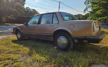 Oldsmobile-88-brougham-1990-brown-4