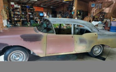 Oldsmobile-88-lss-1957-Burgundy-Off-White-13