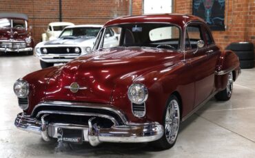 Oldsmobile-Rocket-88-1949-Burgundy-Dark-Charcoal-12