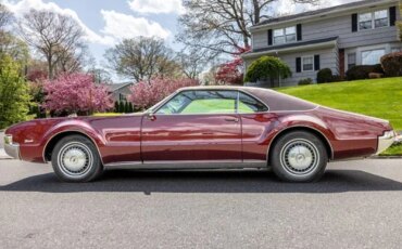 Oldsmobile-Toronado-1967-Red-Red-11