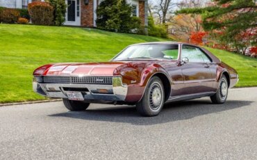 Oldsmobile-Toronado-1967-Red-Red