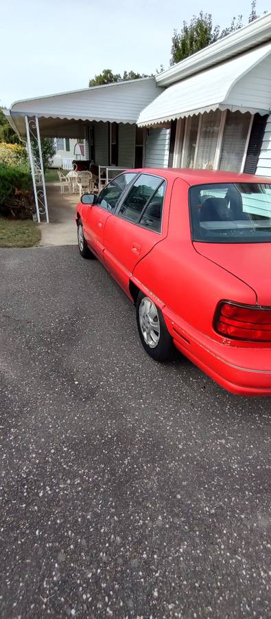 Oldsmobile-achieva-1994-red-2