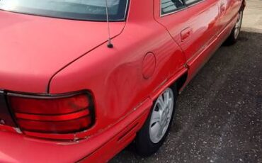 Oldsmobile-achieva-1994-red-3