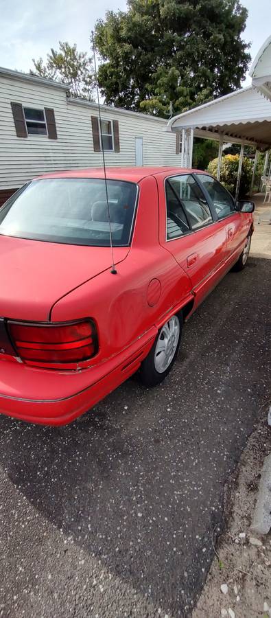 Oldsmobile-achieva-1994-red-3