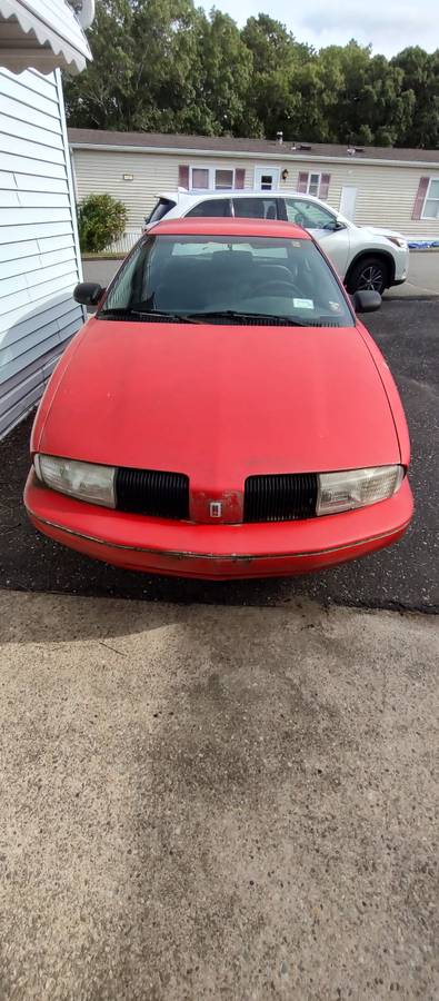 Oldsmobile-achieva-1994-red