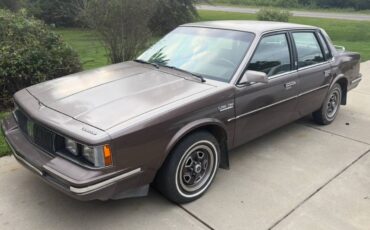 Oldsmobile-cutlass-1984-brown