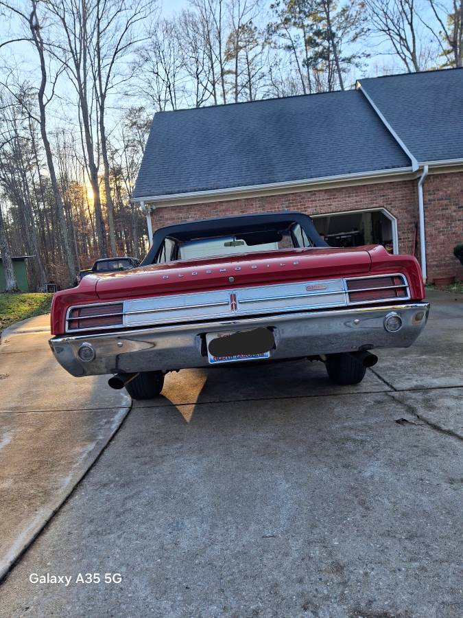 Oldsmobile-cutlass-convertible-1965-red-18
