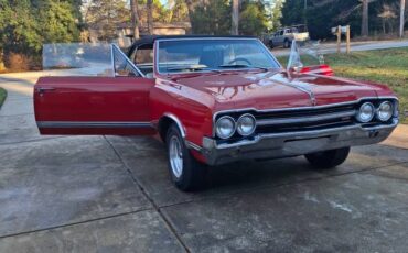 Oldsmobile-cutlass-convertible-1965-red