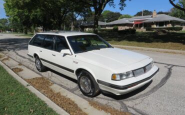 Oldsmobile-cutlass-cruiser-1989-white-3