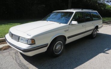 Oldsmobile-cutlass-cruiser-1989-white