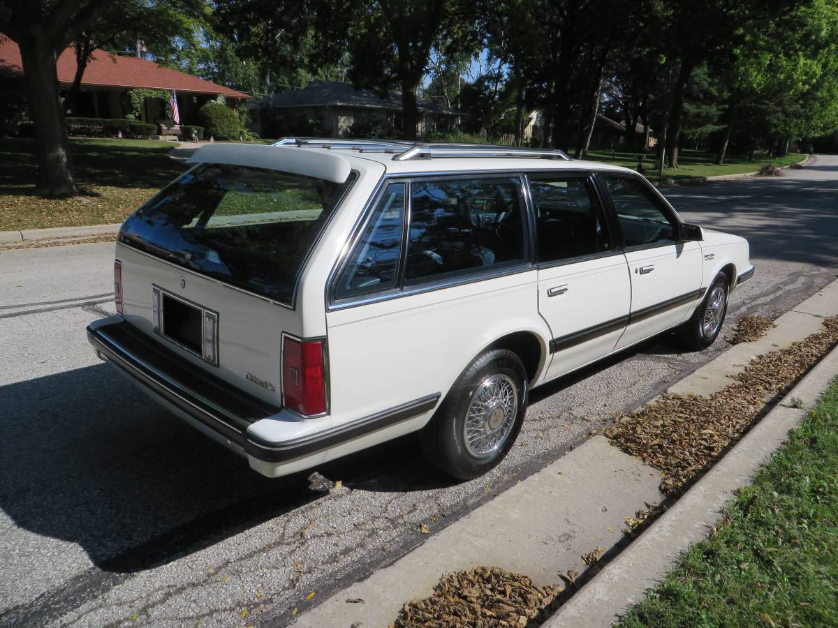 Oldsmobile-cutlass-cruiser-1989-white-9