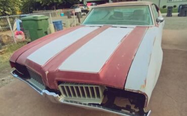 Oldsmobile-cutlass-holiday-s-1969-red-1