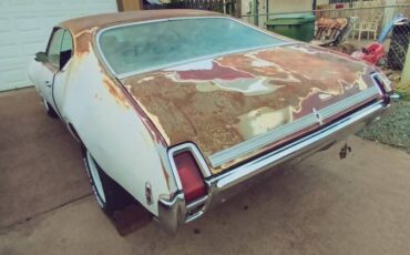 Oldsmobile-cutlass-holiday-s-1969-red-2
