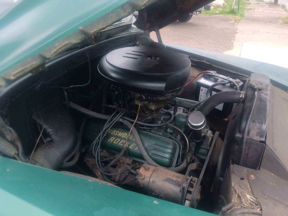 Oldsmobile-quotrrocketquot-88-1952-green-11