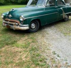 Oldsmobile-quotrrocketquot-88-1952-green-12