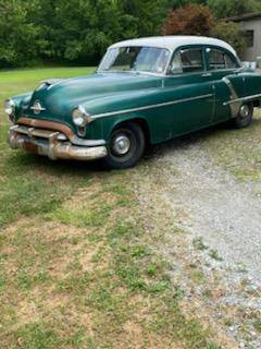 Oldsmobile-quotrrocketquot-88-1952-green-12