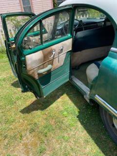 Oldsmobile-quotrrocketquot-88-1952-green-17