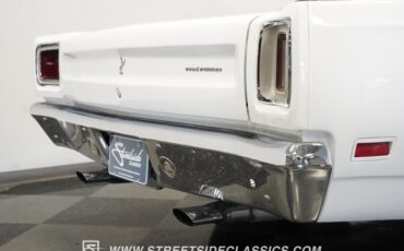 Plymouth-Road-runner-1969-White-Black-40