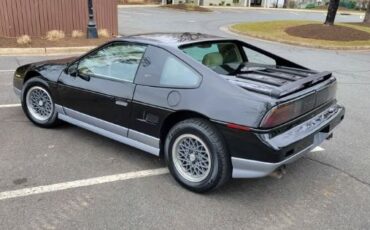 Pontiac-Fiero-1986-Black-Tan-10