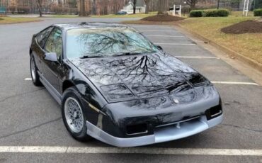Pontiac-Fiero-1986-Black-Tan-18