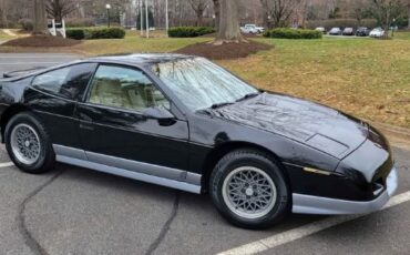 Pontiac-Fiero-1986-Black-Tan-8