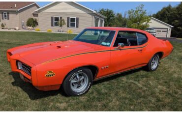 Pontiac-Gto-the-judge-1969-Carousel-Red-Black